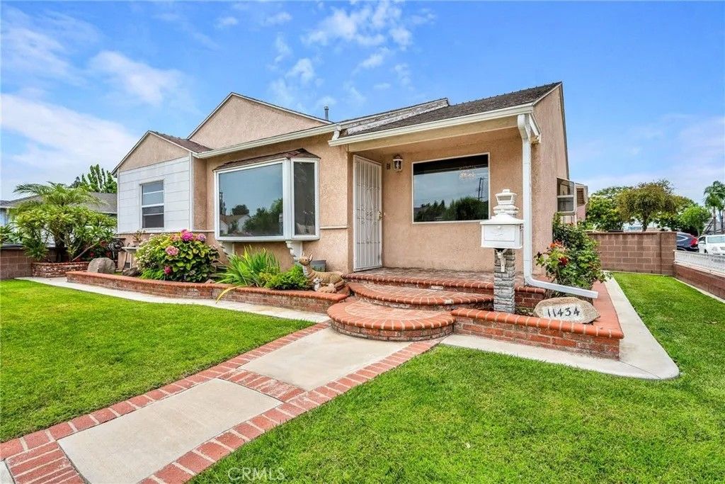 Photo of 11434 Lowemont Street, Norwalk, CA 90650 (MLS # SB26154112)
