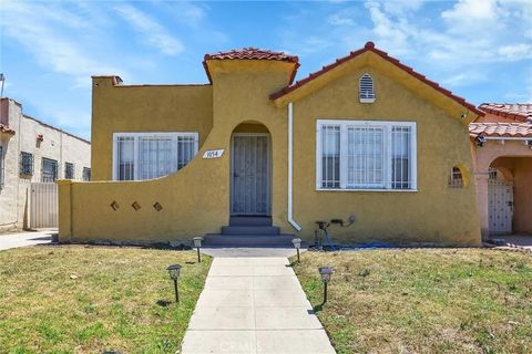 Photo of 1054 W 81st Place, Los Angeles, CA 90044 (MLS # SB25282336)