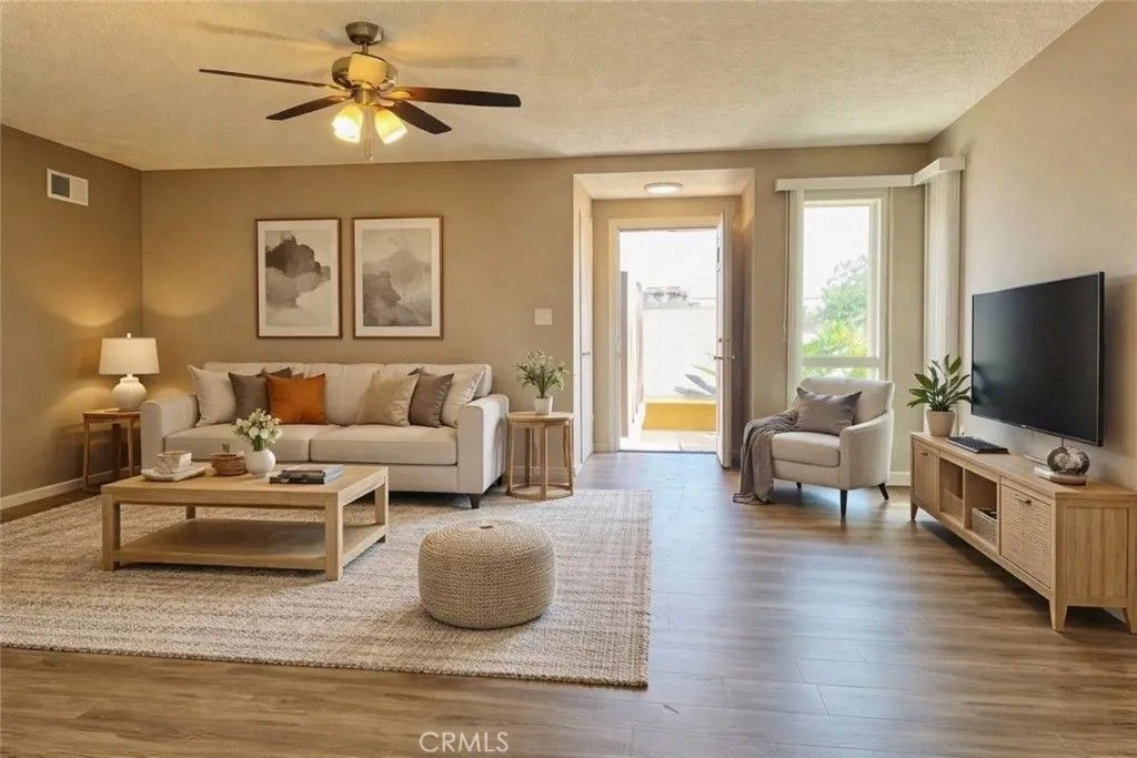 Photo of 15641 TUSTIN VILLAGE Way #A, Tustin, CA 92780 (MLS # NP26081339)