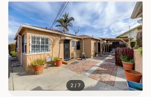 Photo of 1232 109th Street, Los Angeles, CA 90044 (MLS # PW26140630)