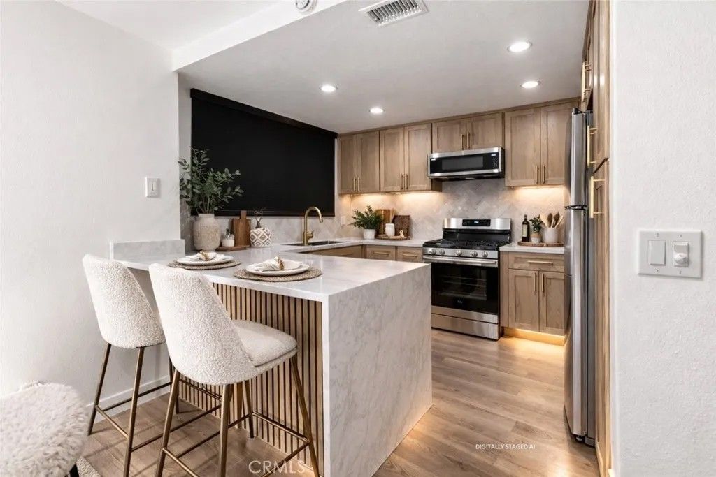 Photo of 12 Woodleaf, Irvine, CA 92614 (MLS # PW26036826)