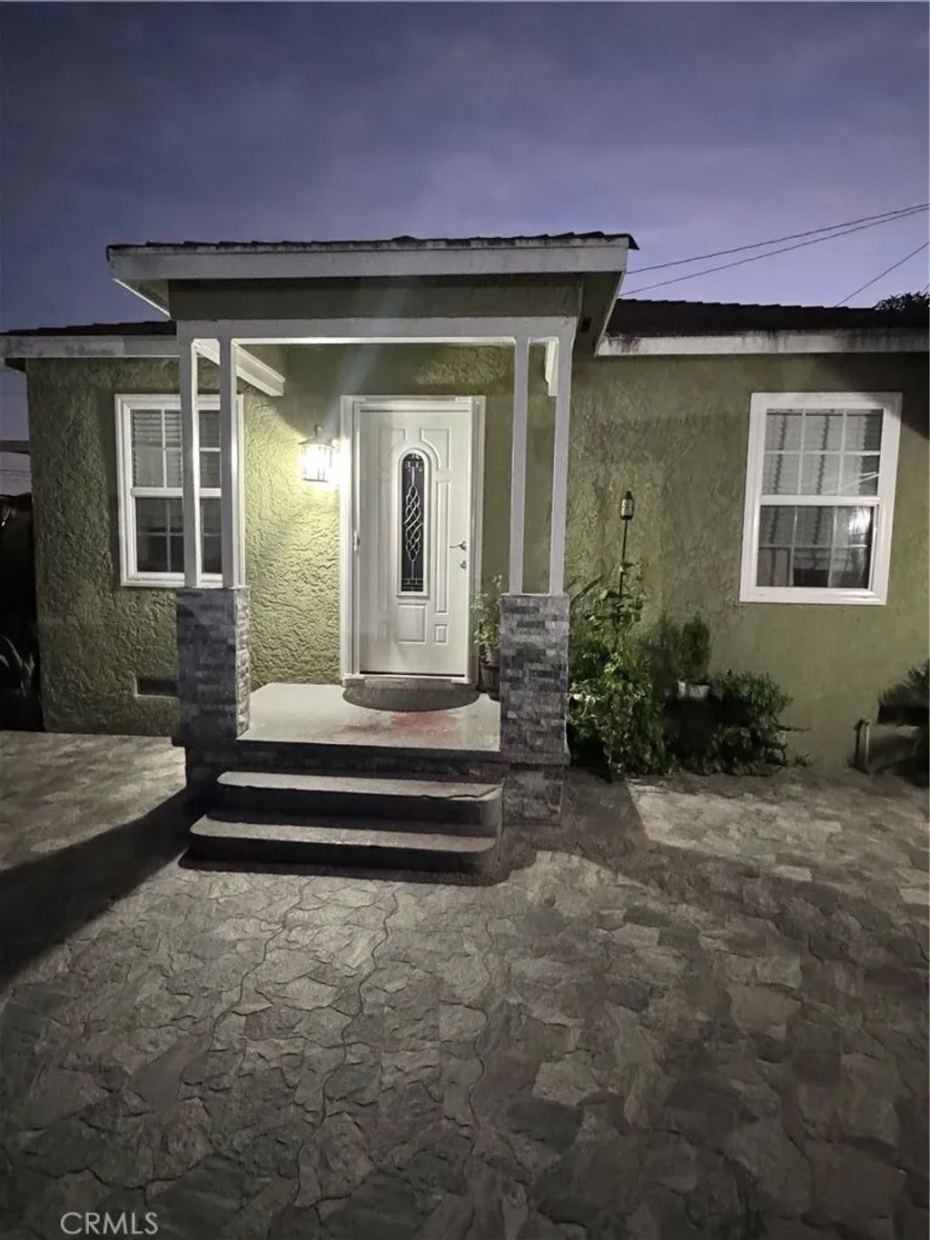 Photo of 12716 Cookacre Avenue, Lynwood, CA 90262 (MLS # CV25253962)