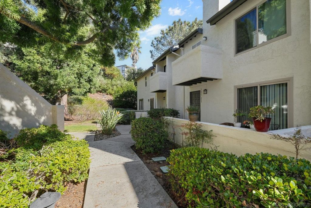 Photo of 6655 Canyon Rim Row #208, San Diego, CA 92111 (MLS # 250040930)