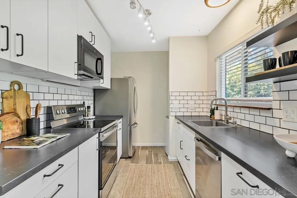 Photo of 6725 Mission Gorge #305B, San Diego, CA 92120 (MLS # 260010040)