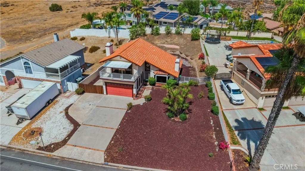 Photo of 22024 Vacation Drive, Canyon Lake, CA 92587 (MLS # SW26198551)