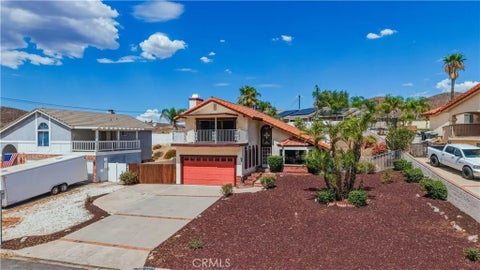 Photo of 22024 Vacation Drive, Canyon Lake, CA 92587 (MLS # SW26198551)