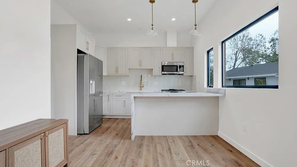 Photo of 12752 Martha Ann Dr, Los Alamitos, CA 90720 (MLS # NP26072124)