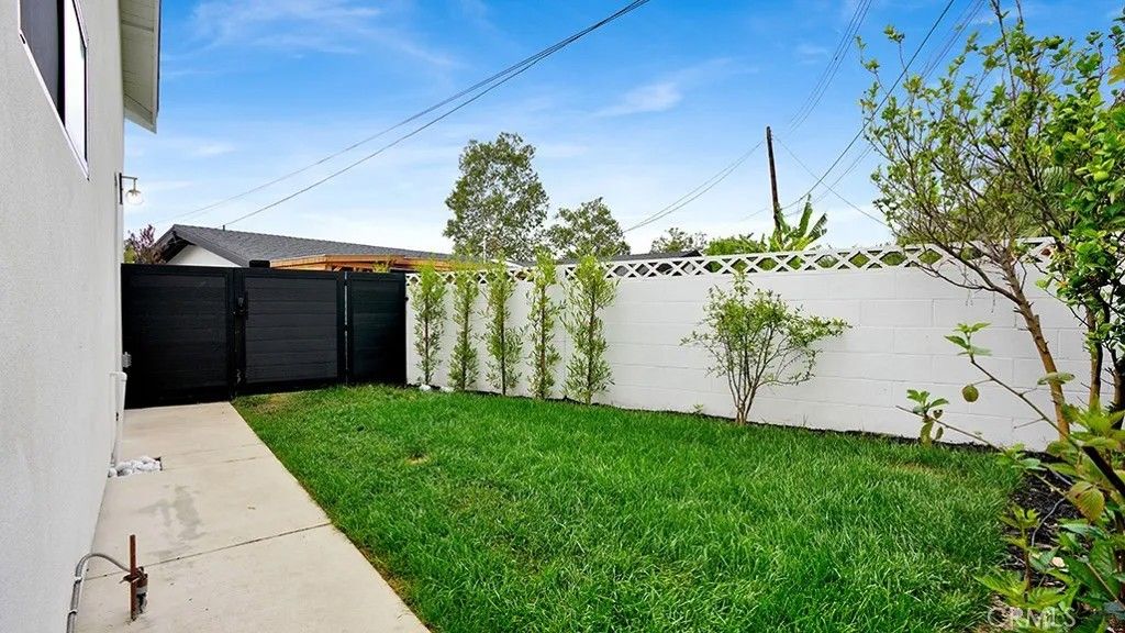 Photo of 12752 Martha Ann Dr, Los Alamitos, CA 90720 (MLS # NP26072124)