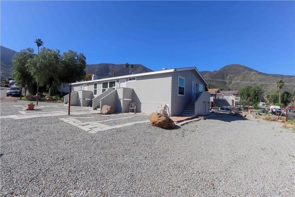 Photo of 17457 Ranspot Ave, Lake Elsinore, CA 92530 (MLS # SW26039210)