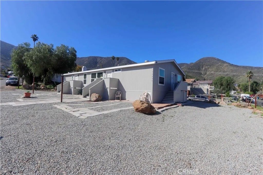 Photo of 17457 Ranspot Ave, Lake Elsinore, CA 92530 (MLS # SW26039210)