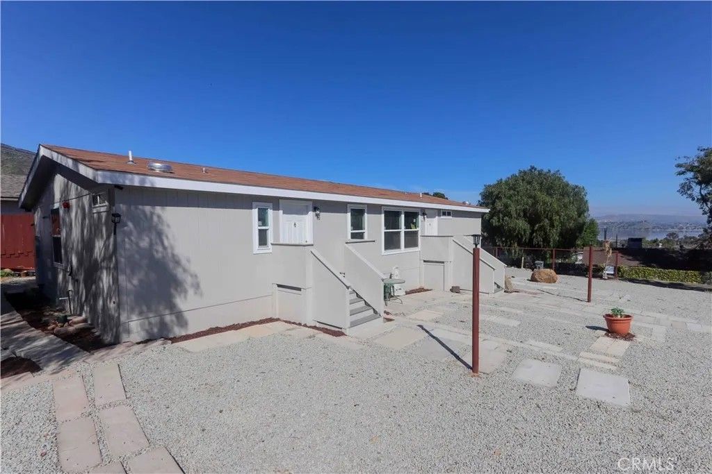 Photo of 17457 Ranspot Ave, Lake Elsinore, CA 92530 (MLS # SW26039210)
