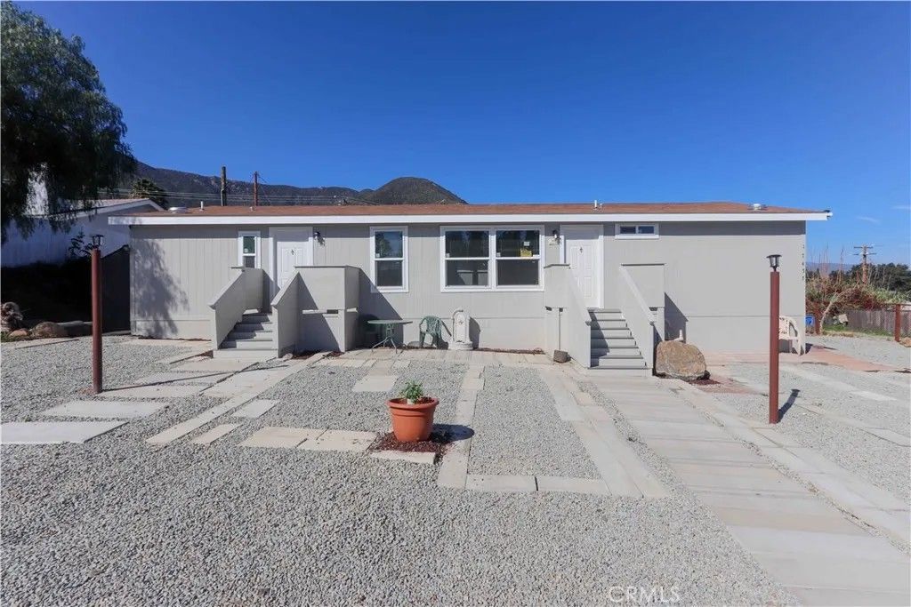 Photo of 17457 Ranspot Ave, Lake Elsinore, CA 92530 (MLS # SW26039210)