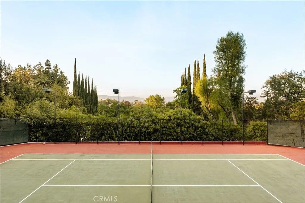 Photo of 19540 Wells Drive, Tarzana, CA 91356 (MLS # SR26020507)
