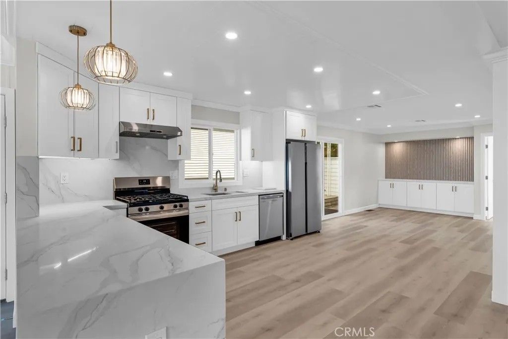 Photo of 24001 Muirlands Blvd #115, Lake Forest, CA 92630 (MLS # OC25279952)