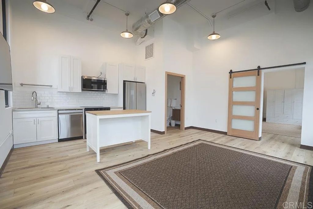 Photo of 5063 Waterview Way #102, Oceanside, CA 92057 (MLS # NDP2602087)