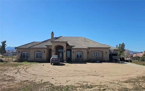 Photo of 7677 Mono Rd, Phelan, CA 92371 (MLS # CV26048736)