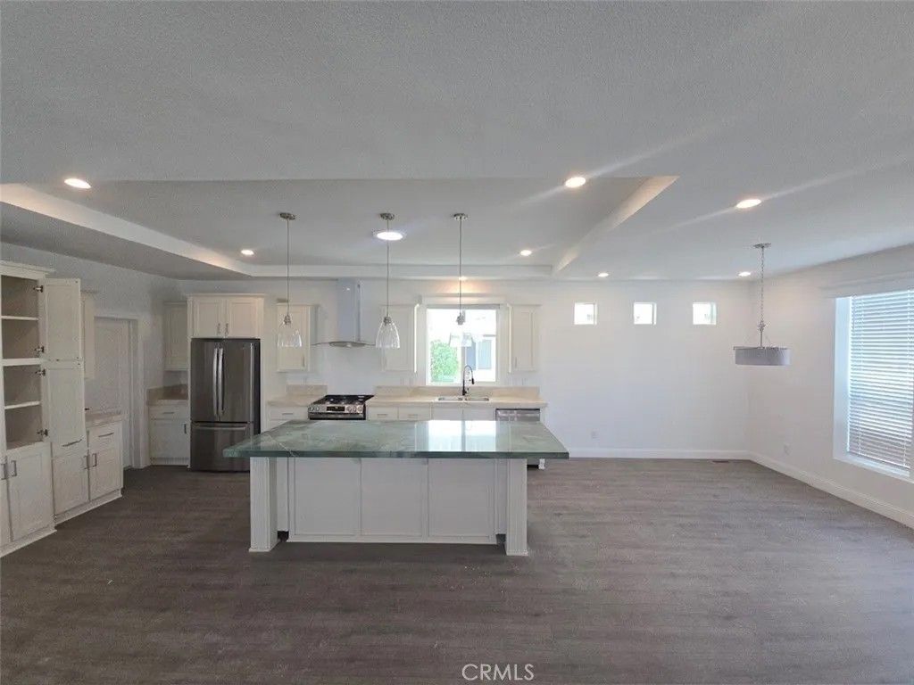 Photo of 8901 Eton Ave #54, Northridge, CA 91304 (MLS # SR26078004)