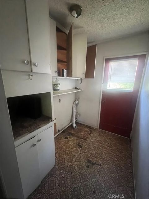 Photo of 425 W Elm Street, Hanford, CA 93230 (MLS # FR25253892)