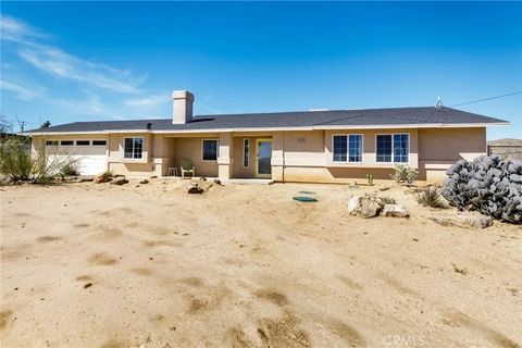 Photo of 8444 Acoma Trail, Yucca Valley, CA 92284 (MLS # PF26054684)