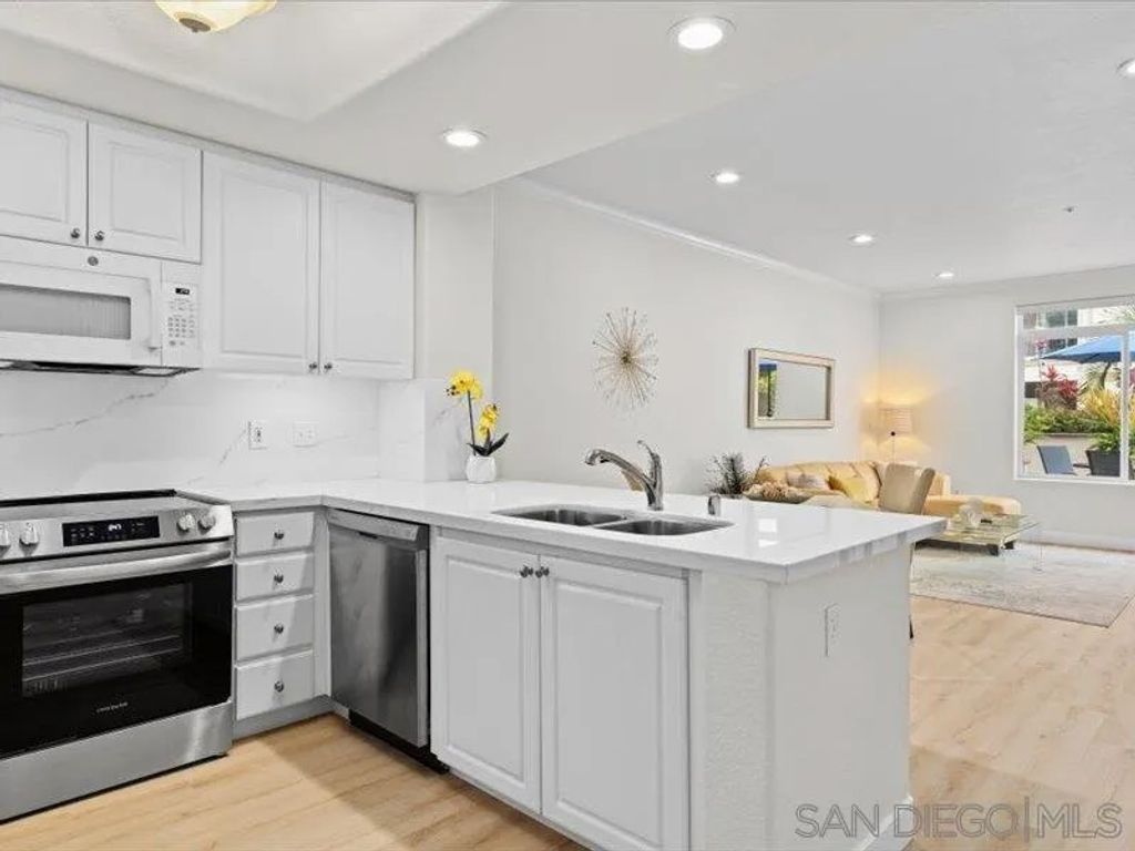 Photo of 9237 Regents Rd #K101, La Jolla, CA 92037 (MLS # 260012096)