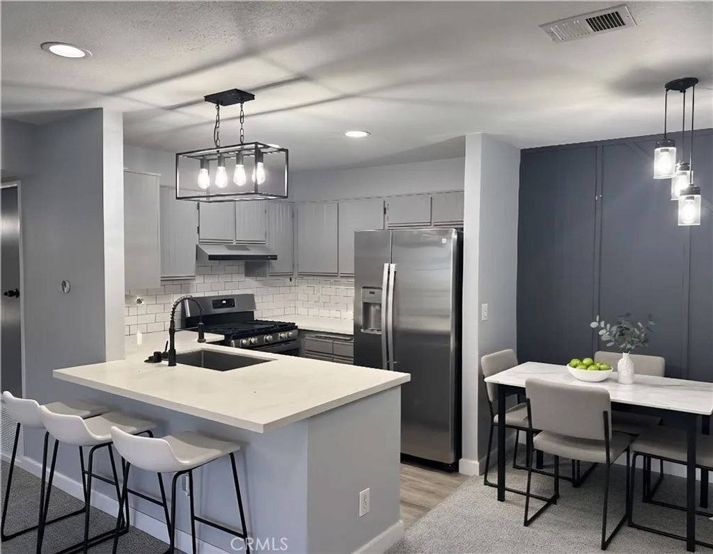 Photo of 23605 Del Monte Drive #254, Valencia, CA 91355 (MLS # SR25278778)