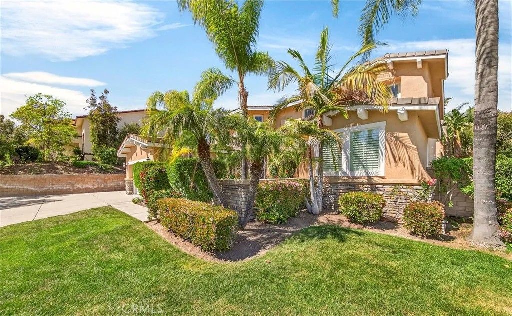 Photo of 1749 Tamarron Drive, Corona, CA 92883 (MLS # IG26056160)