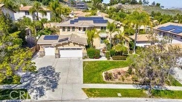 Photo of 1749 Tamarron Drive, Corona, CA 92883 (MLS # IG26056160)
