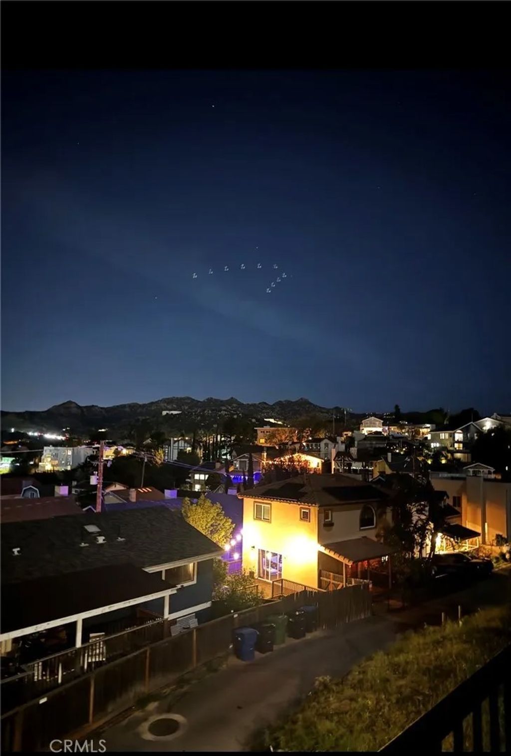 Photo of 21415 Arapahoe Trl, Chatsworth, CA 91311 (MLS # SR26028758)