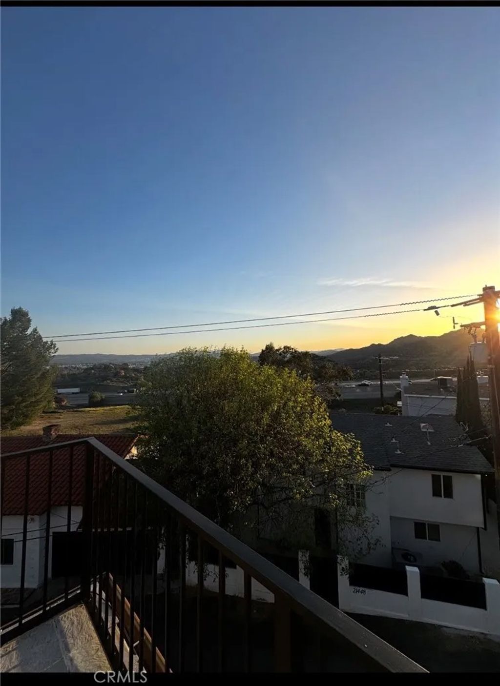 Photo of 21415 Arapahoe Trl, Chatsworth, CA 91311 (MLS # SR26028758)