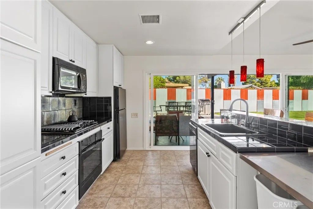 Photo of 1126 E El Cid, Palm Springs, CA 92262 (MLS # OC26015501)