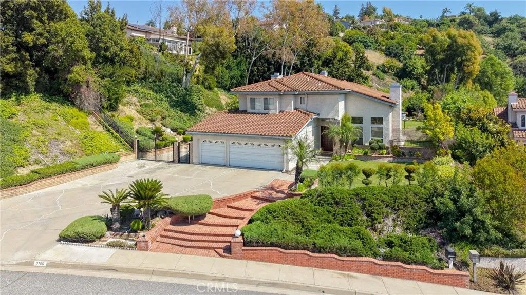 Photo of 3180 E Hillside Dr, West Covina, CA 91791 (MLS # PW26095295)