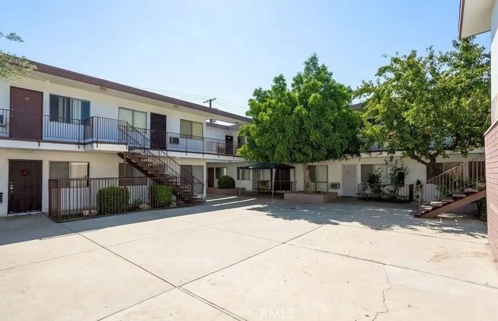Photo of 13050 Dronfield Avenue #14, Sylmar, CA 91342 (MLS # BB26009058)