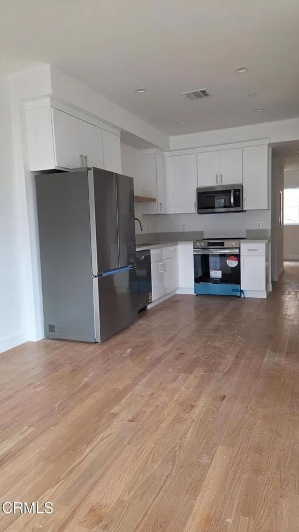 Photo of 917 N Ridgewood Place, Los Angeles, CA 90038 (MLS # P1-26678)