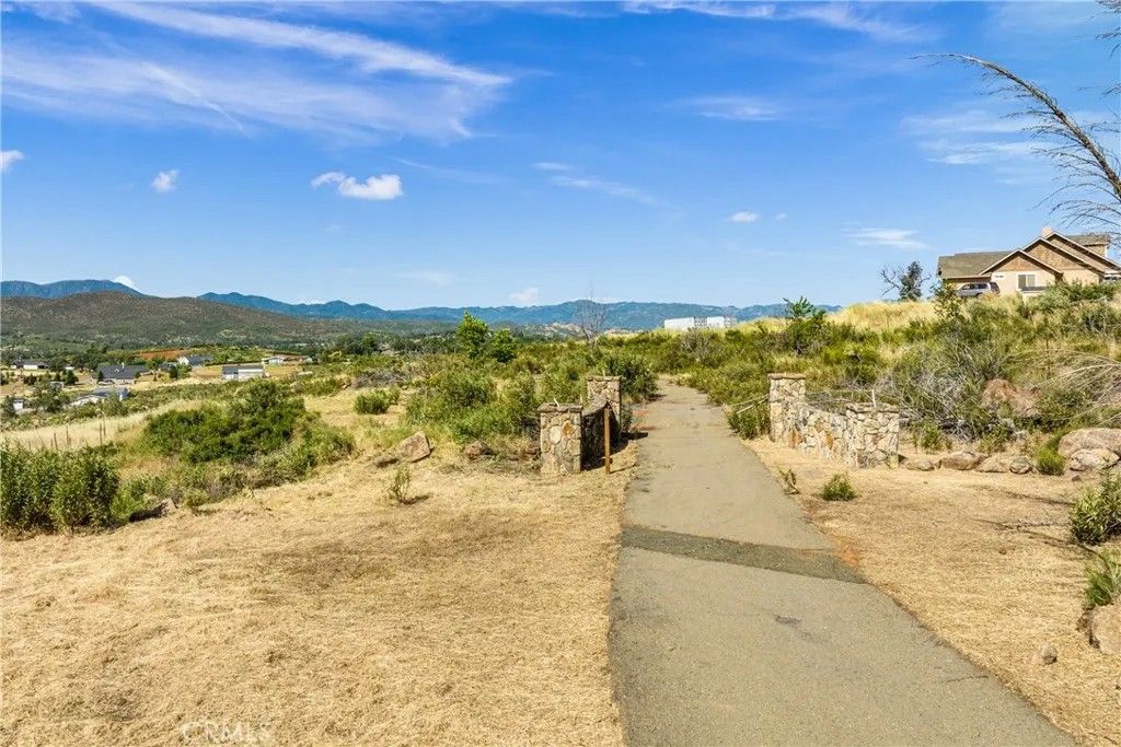 Photo of 21810 Yankee Valley, Hidden Valley Lake, CA 95467 (MLS # LC26033949)