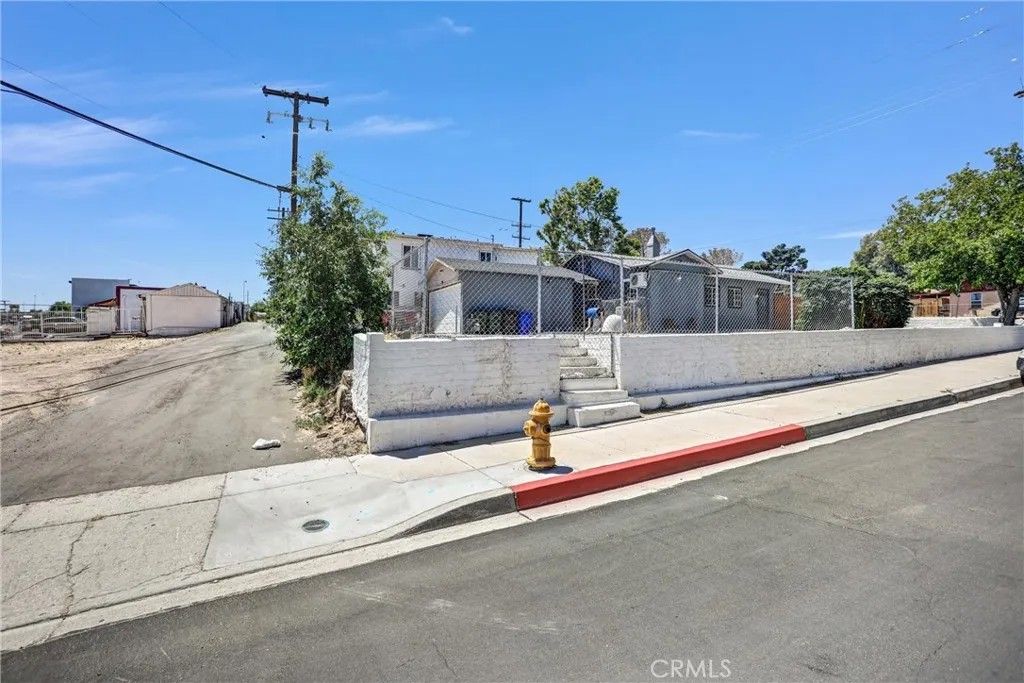 Photo of 16853 Forrest Ave, Victorville, CA 92395 (MLS # DW26089772)