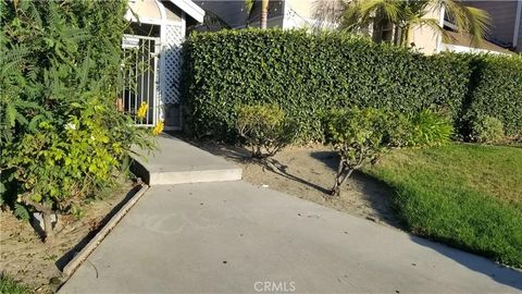 Photo of 9826 California Ave, South Gate, CA 90280 (MLS # DW25246285)