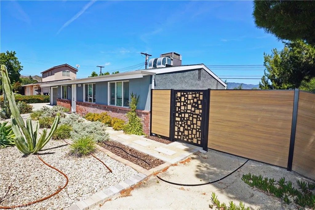 Photo of 12350 Luna Place, Granada Hills, CA 91344 (MLS # GD26090371)