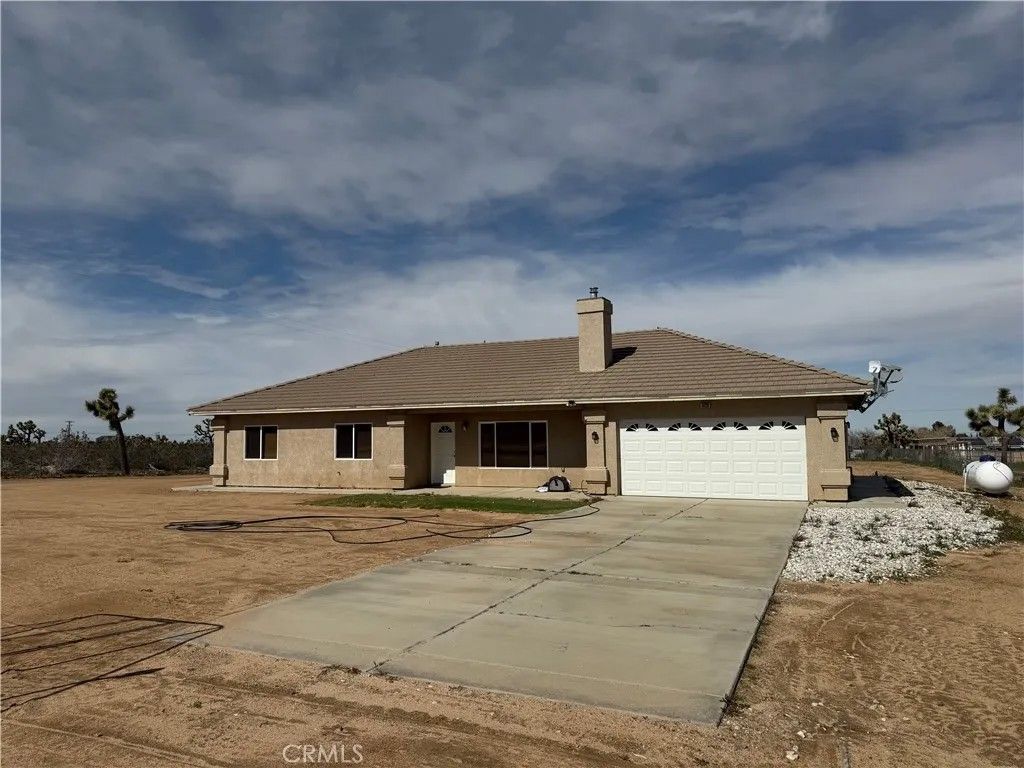 Photo of 8720 Greasewood Lane, Victorville, CA 92392 (MLS # HD26038330)