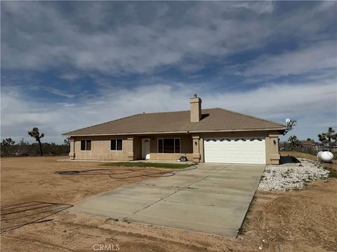 Photo of 8720 Greasewood Lane, Victorville, CA 92392 (MLS # HD26038330)