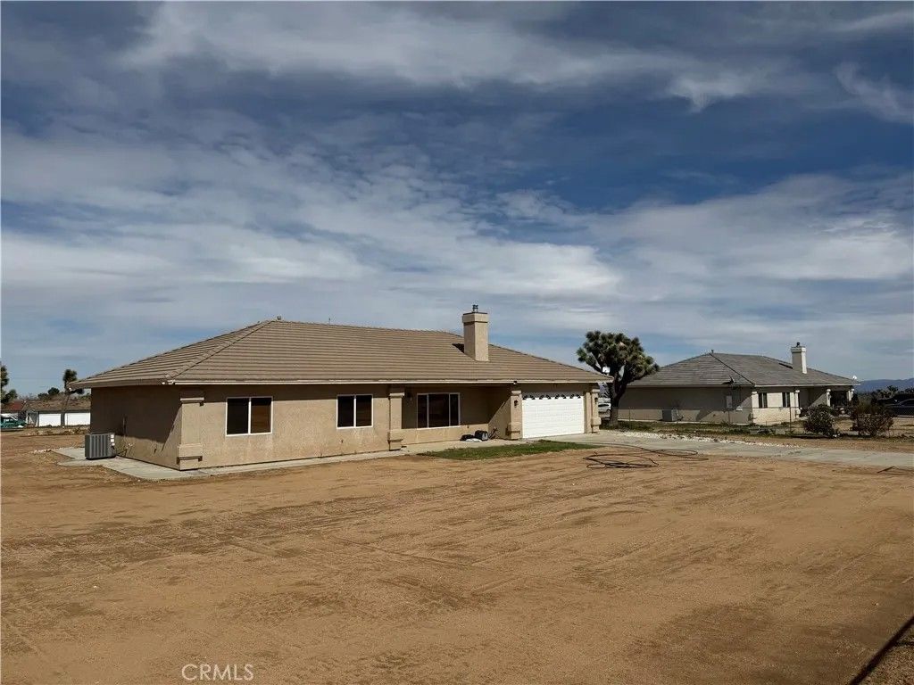 Photo of 8720 Greasewood Lane, Victorville, CA 92392 (MLS # HD26038330)