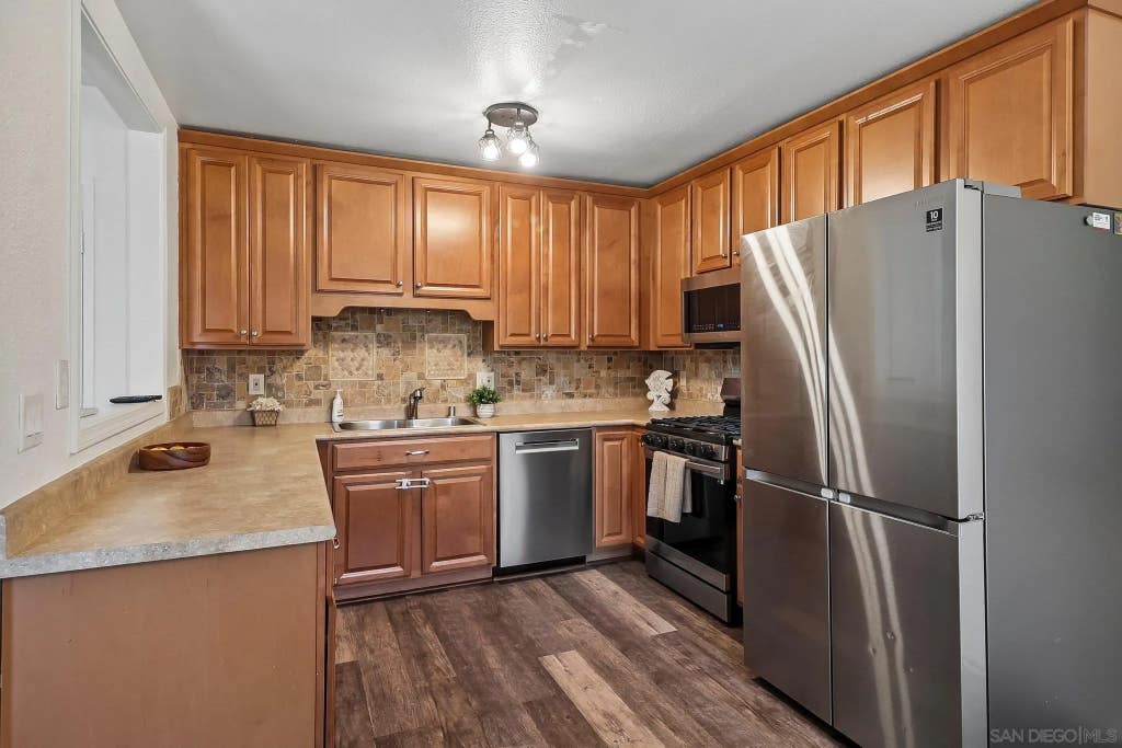 Photo of 598 Tam O Shanter Dr, San Marcos, CA 92069 (MLS # 260020870)