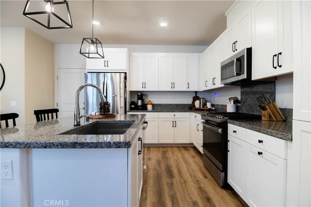 Photo of 3942 Lavine Way, Corona, CA 92883 (MLS # IG25239063)