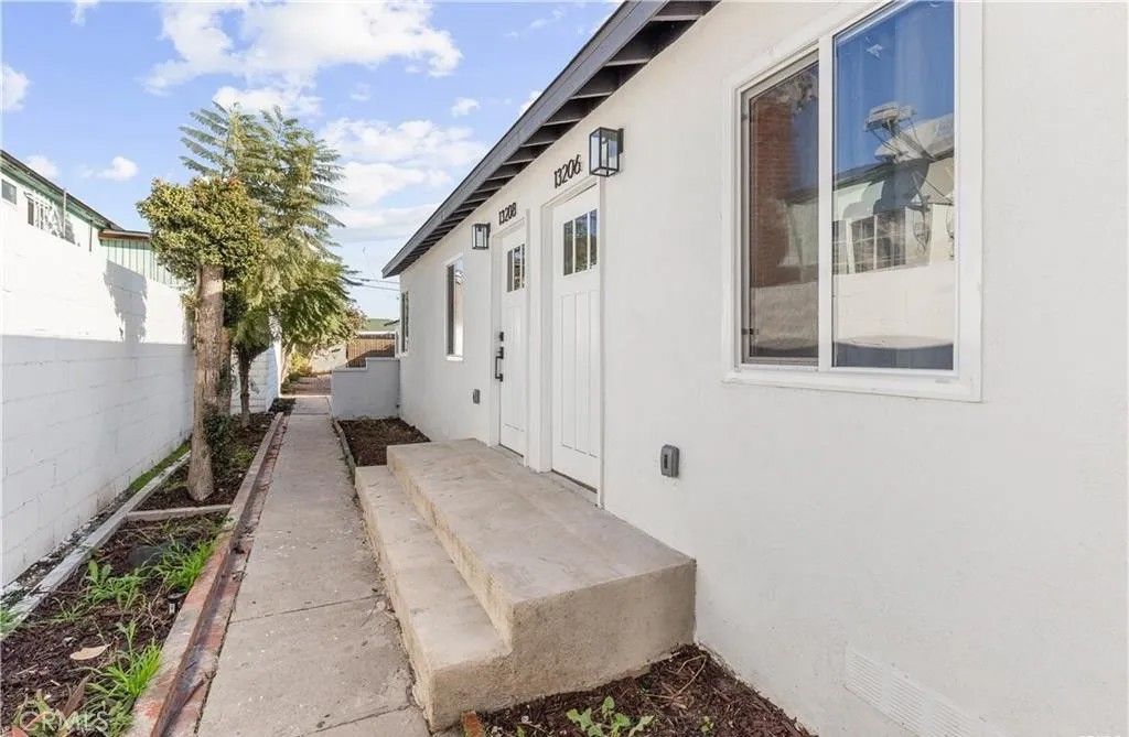 Photo of 13206 S Vermont Ave, Gardena, CA 90247 (MLS # DW26090013)