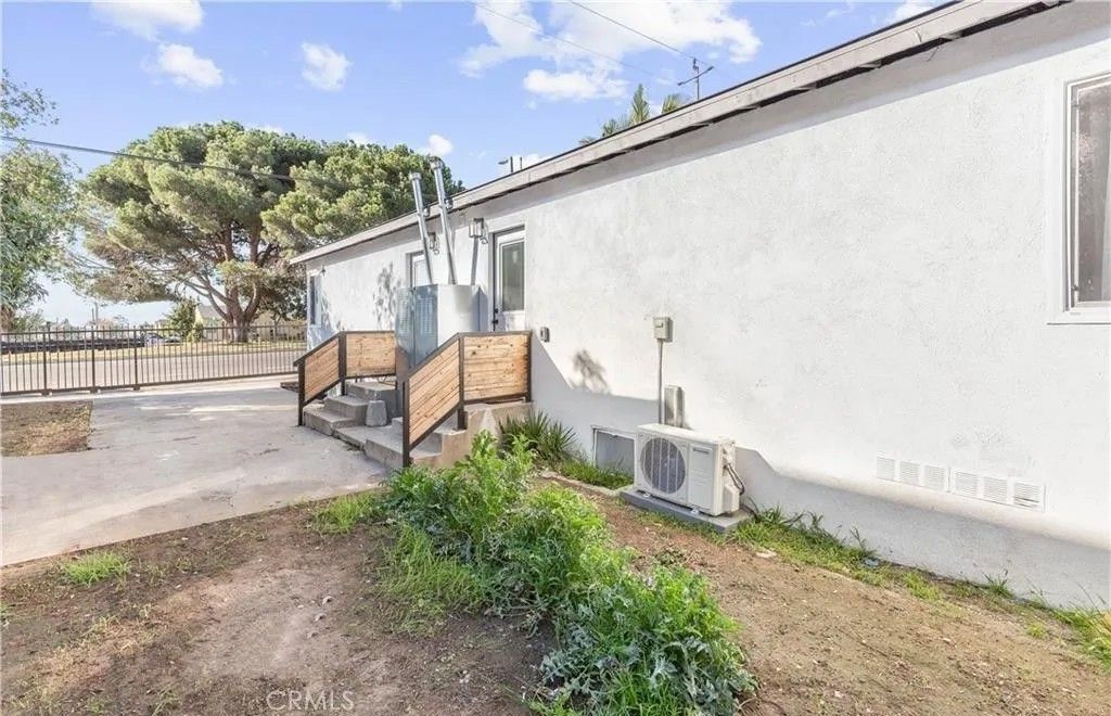 Photo of 13206 S Vermont Ave, Gardena, CA 90247 (MLS # DW26090013)