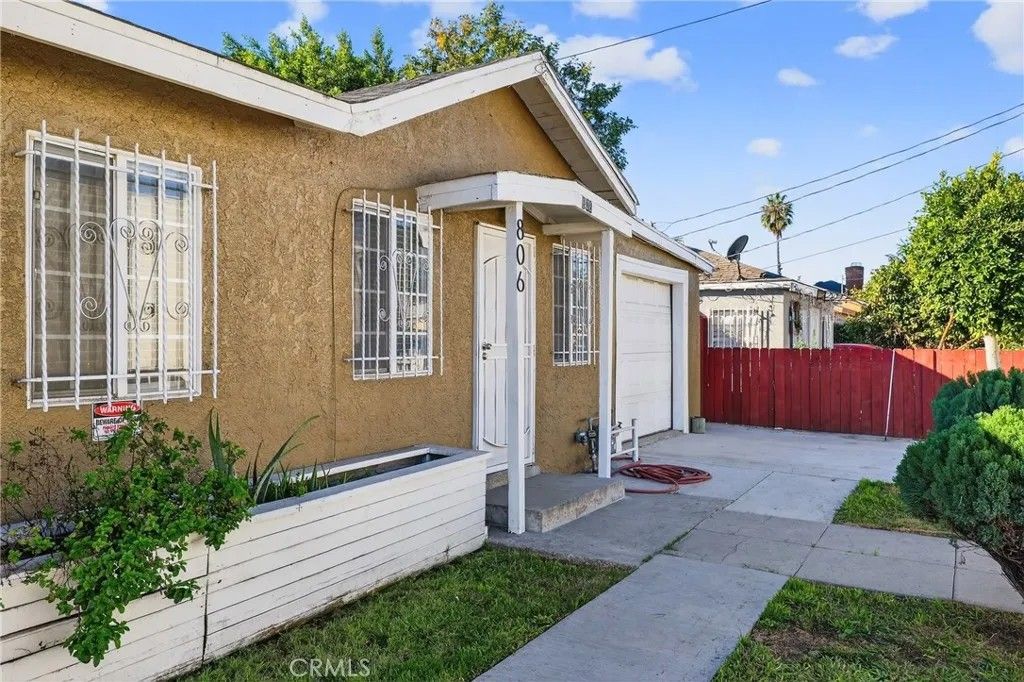 Photo of 806 W Spruce Street, Compton, CA 90220 (MLS # MB26030126)