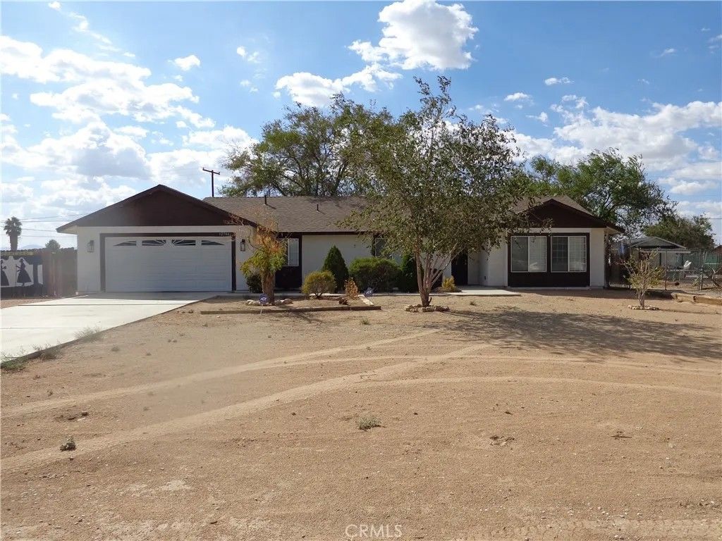 Photo of 12744 Running Deer Rd, Apple Valley, CA 92308 (MLS # CV25272056)