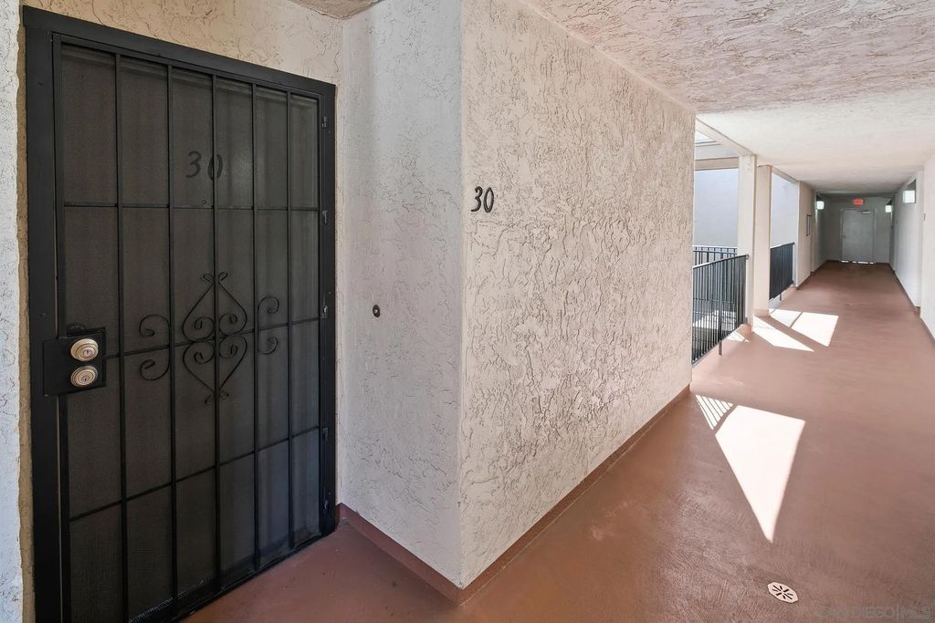 Photo of 6877 Caminito Mundo #30, San Diego, CA 92119 (MLS # 260009733)