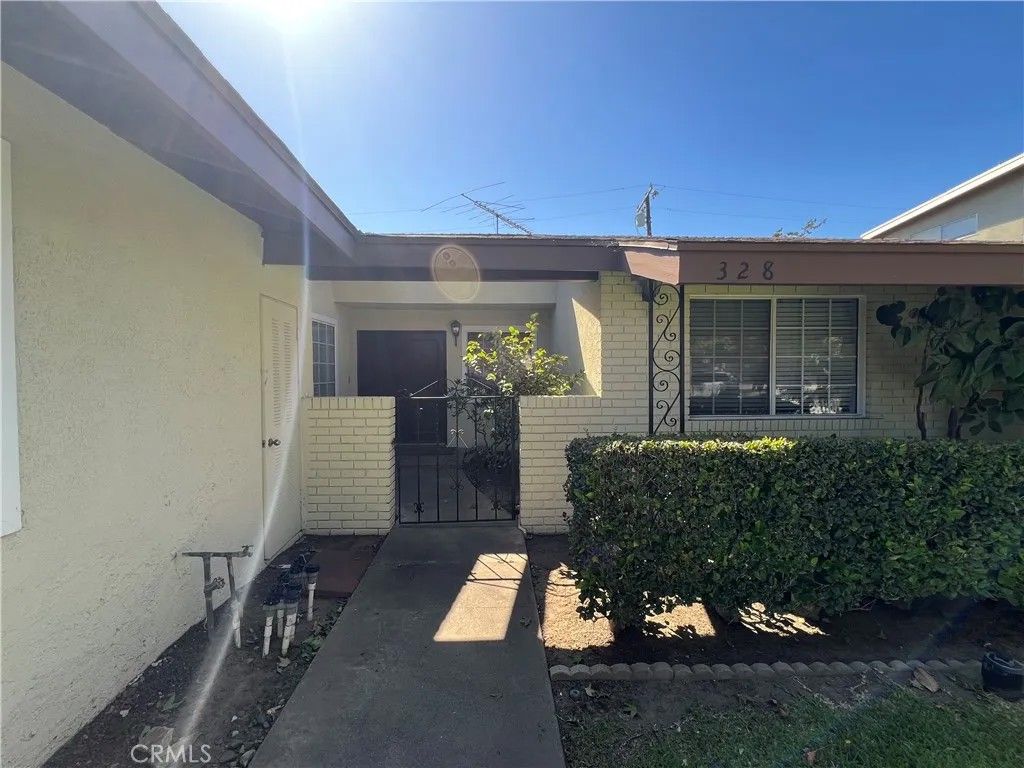 Photo of 328 S Wheeler Place, Orange, CA 92869 (MLS # PW26073922)