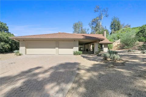 Photo of 9335 Lindante DR, Whittier, CA 90603 (MLS # PW26129036)