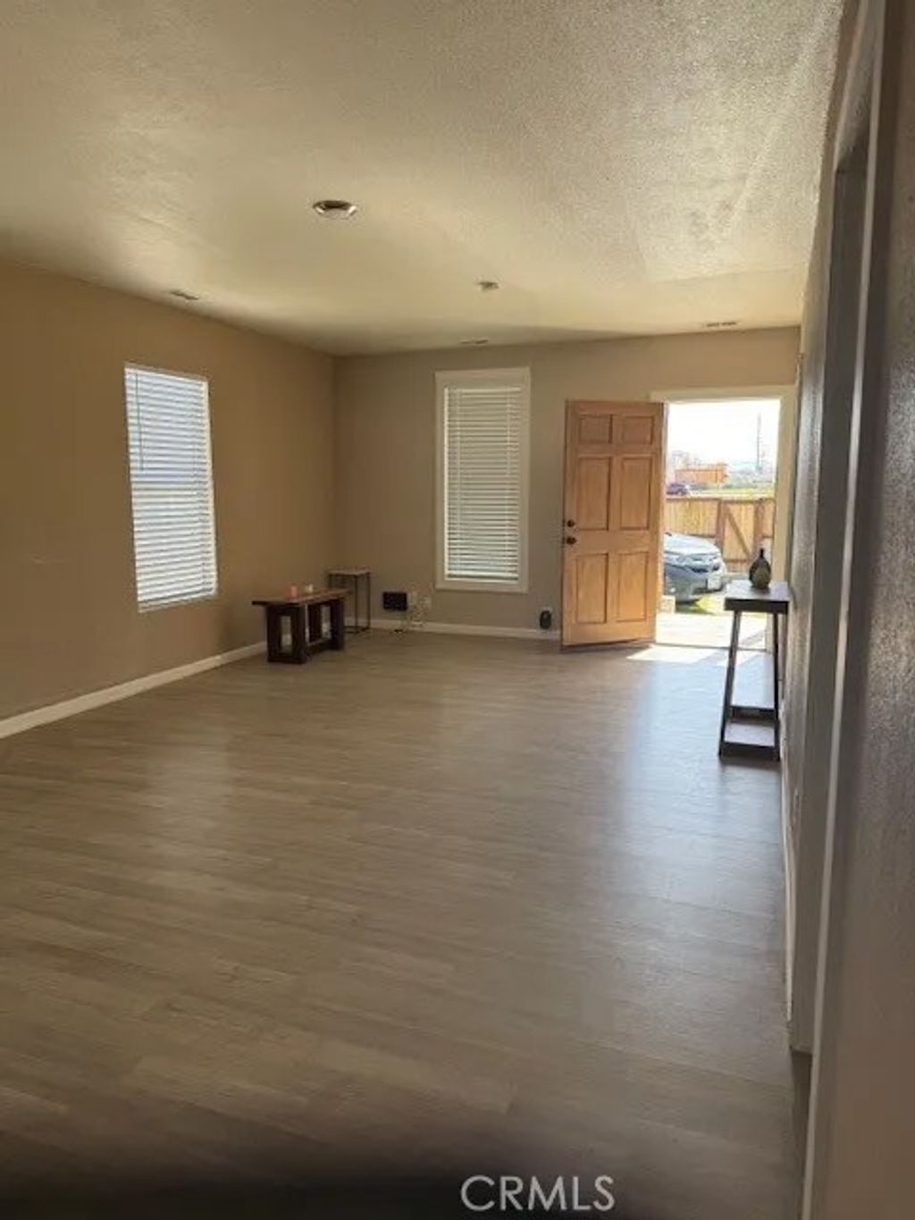 Photo of 941 W Oldfield St, Lancaster, CA 93534 (MLS # SR26026751)